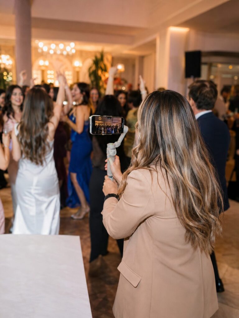 photography and videography services Northeast Florida - A creative workspace featuring a camera, laptop, and notepad, highli